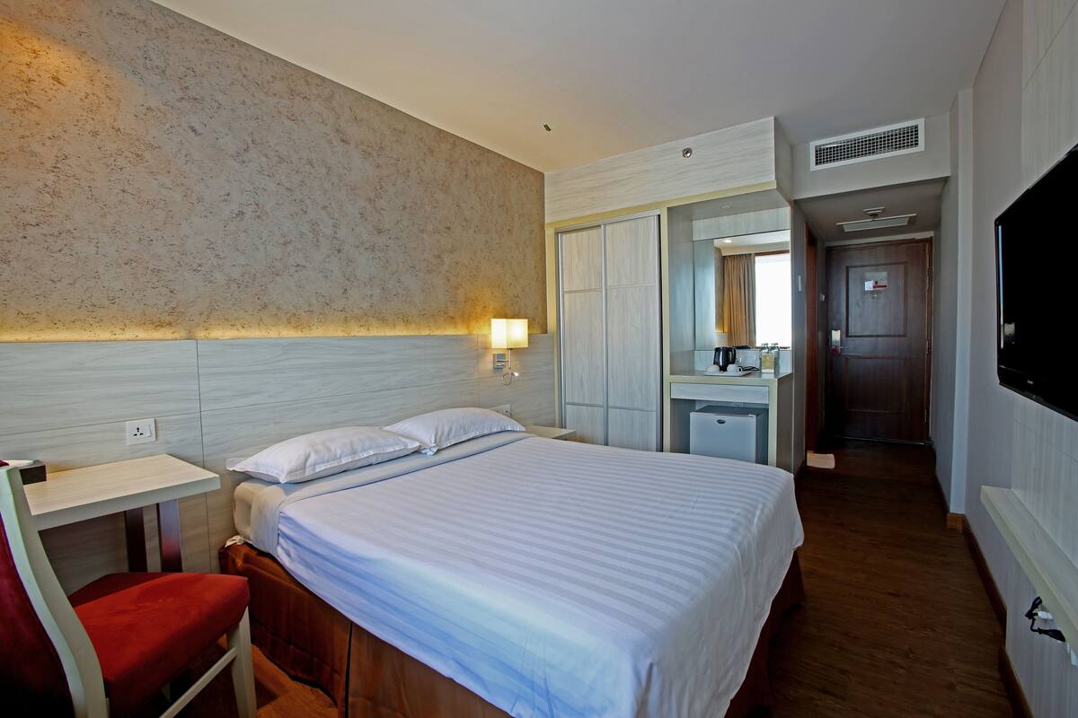 Standard Double Room | Desk, blackout drapes, iron/ironing board (on request)