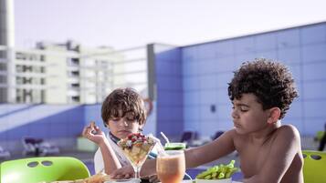 Outdoor pool, open 9:00 AM to 6:00 PM, pool umbrellas, sun loungers