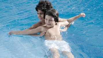 Outdoor pool, open 9:00 AM to 6:00 PM, pool umbrellas, sun loungers