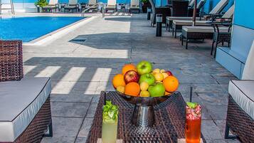 Outdoor pool, open 9:00 AM to 6:00 PM, pool umbrellas, sun loungers