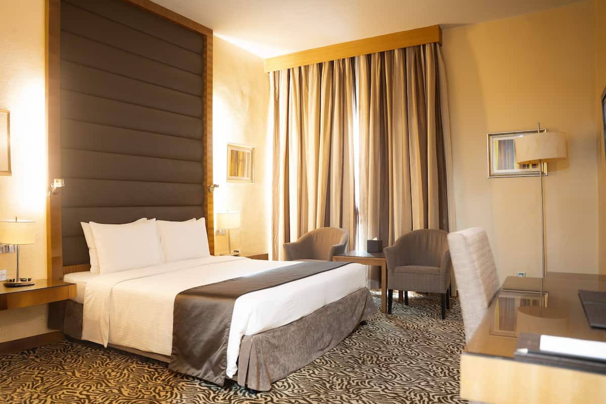 Deluxe Room | 1 bedroom, hypo-allergenic bedding, minibar, in-room safe