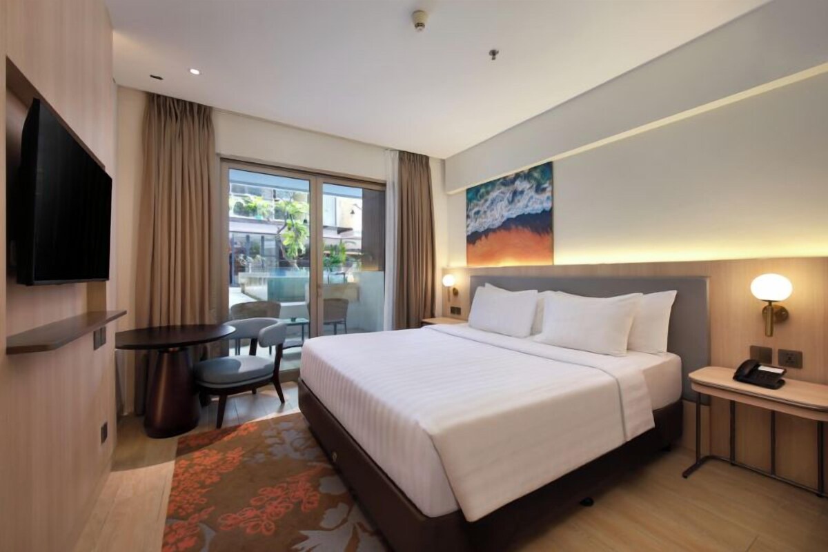 Deluxe Room, Pool Access | In-room safe, desk, laptop workspace, soundproofing