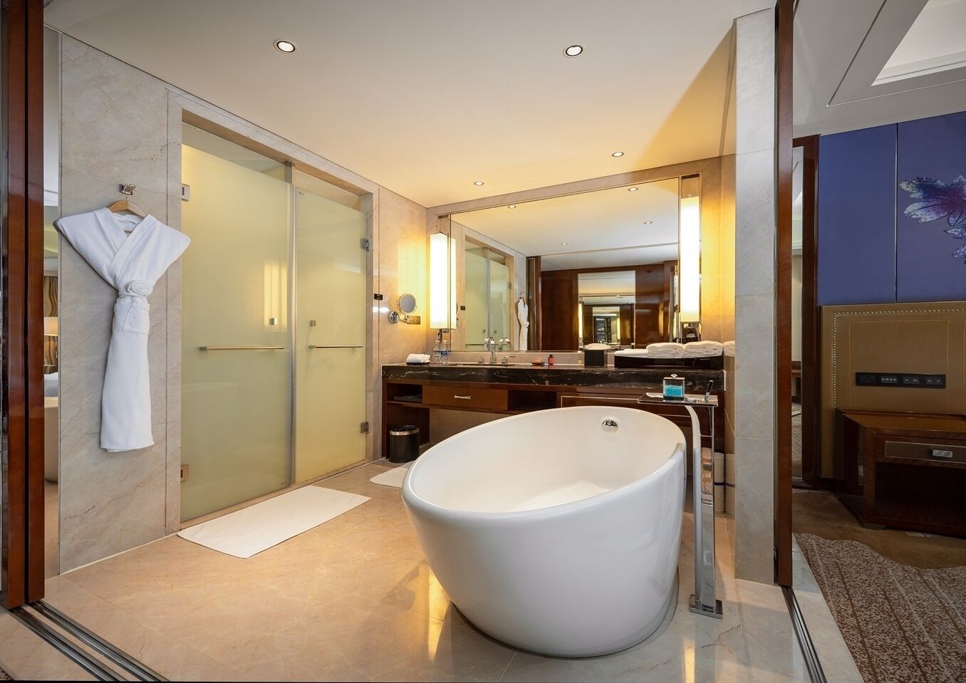 executive king room  | bathroom | combined shower/bathtub, deep-soaking bathtub, designer toiletries