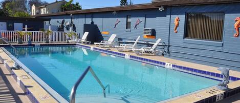 Outdoor pool, pool umbrellas, sun loungers