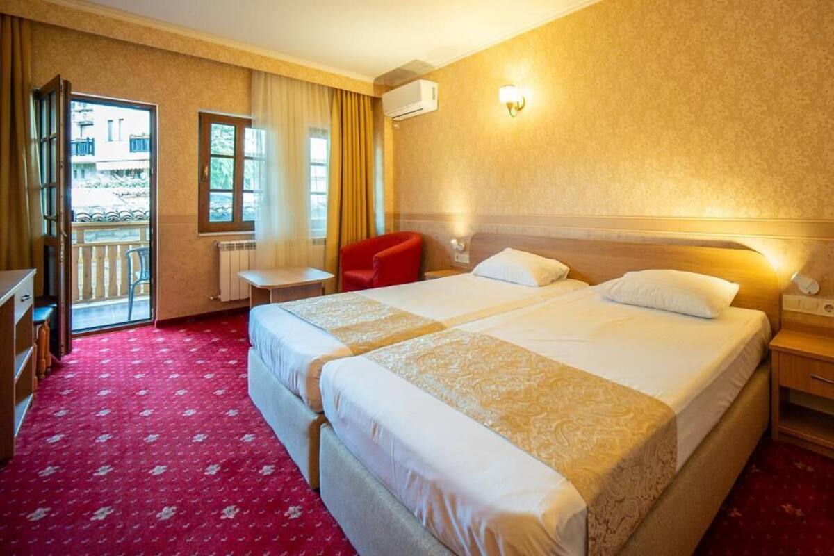 standard double or twin room | minibar, in-room safe, free wifi, bed sheets