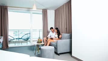 Family Room, Balcony, Sea View | Beach/ocean view