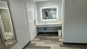 A modern bathroom with a vanity, mirror, and recessed lighting. - Garden Inn Hotel 花園酒店 - Pasadena, San Gabriel - Los Angeles (Temple City)