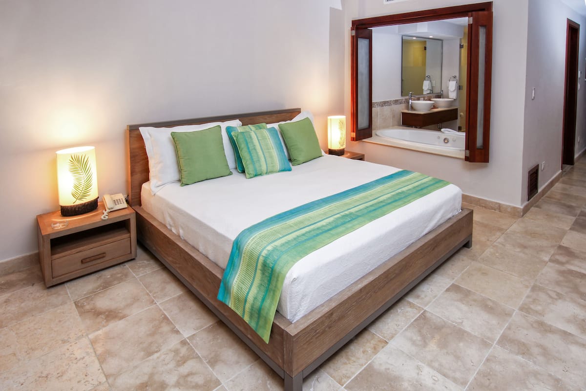 Studio with Garden View | Down comforters, minibar, in-room safe, blackout drapes