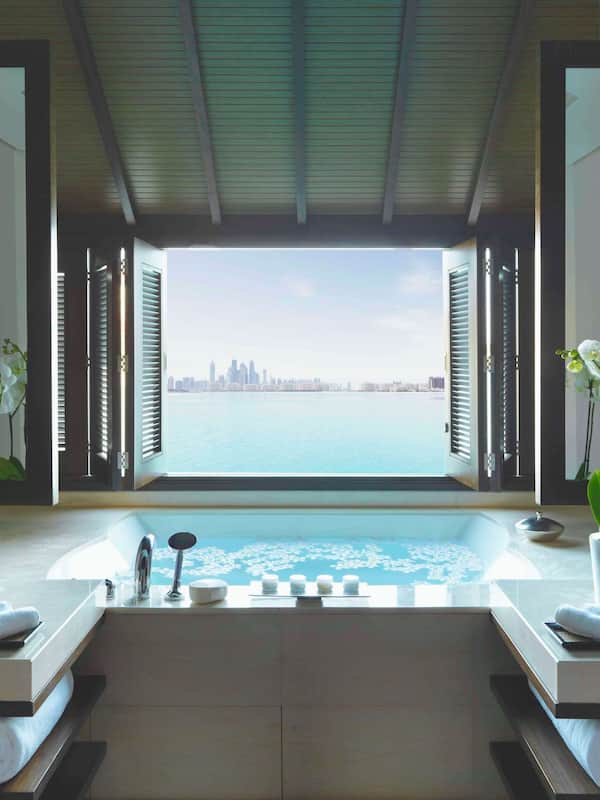 One Bedroom Over Water Villa | Bathroom | Shower, rainfall showerhead, free toiletries, hair dryer