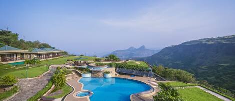 Outdoor pool, open 8 AM to 6 PM, sun loungers