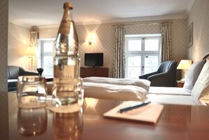 Suite, 1 Double Bed, Sauna, River View | Hypo-allergenic bedding available, in-room safe, blackout drapes