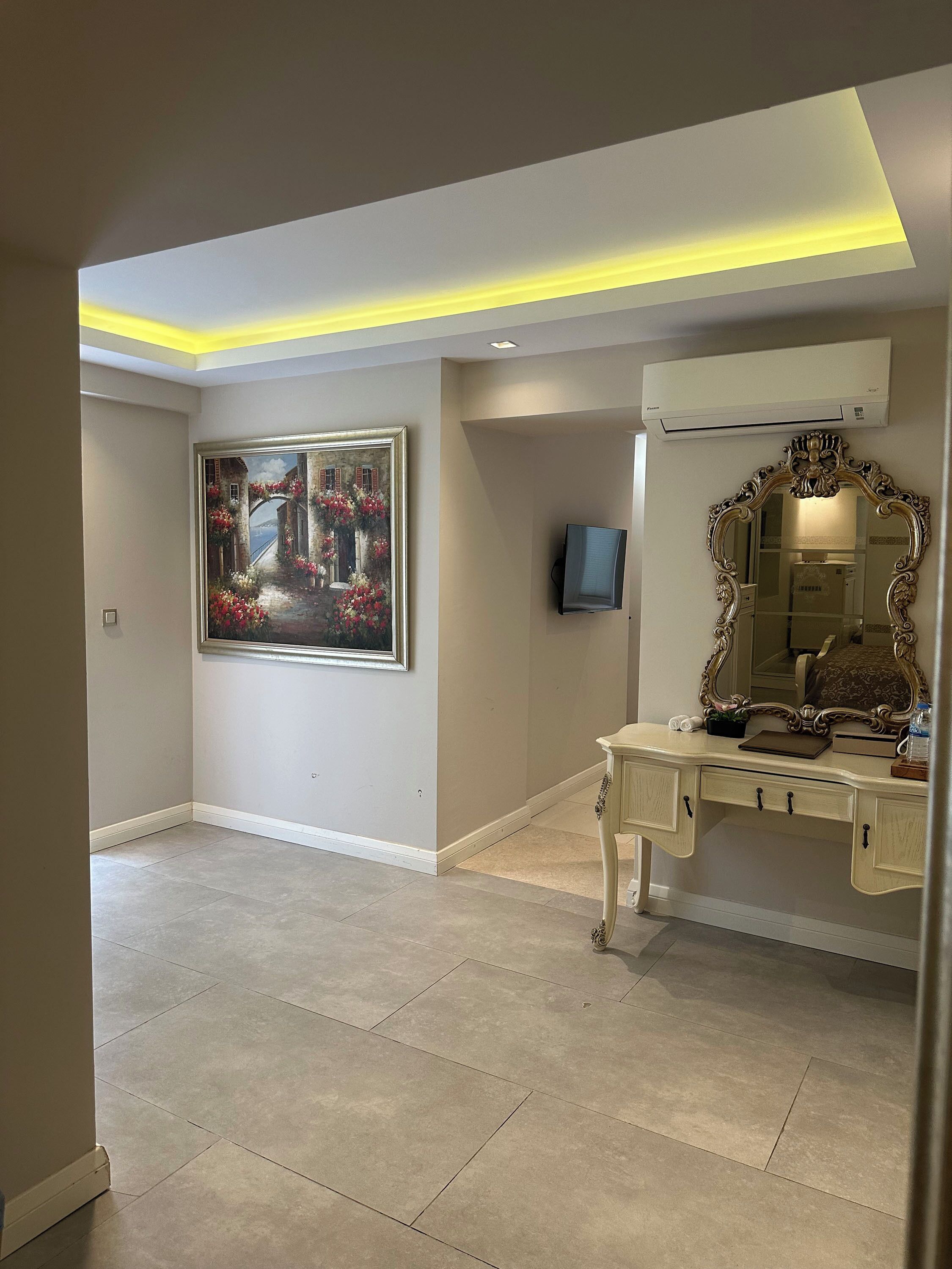 family room | premium bedding, minibar, in-room safe, desk