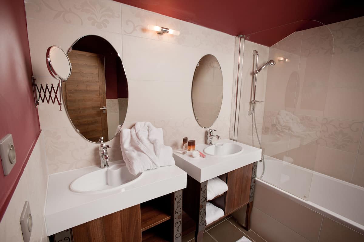 hair dryer, bathrobes, slippers, towels