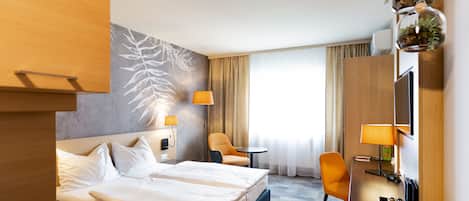 Hypo-allergenic bedding, in-room safe, desk, laptop workspace