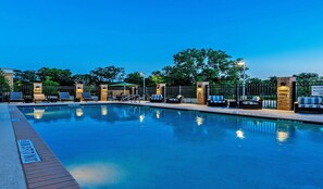 Outdoor pool, open 8 AM to 10 PM, pool loungers