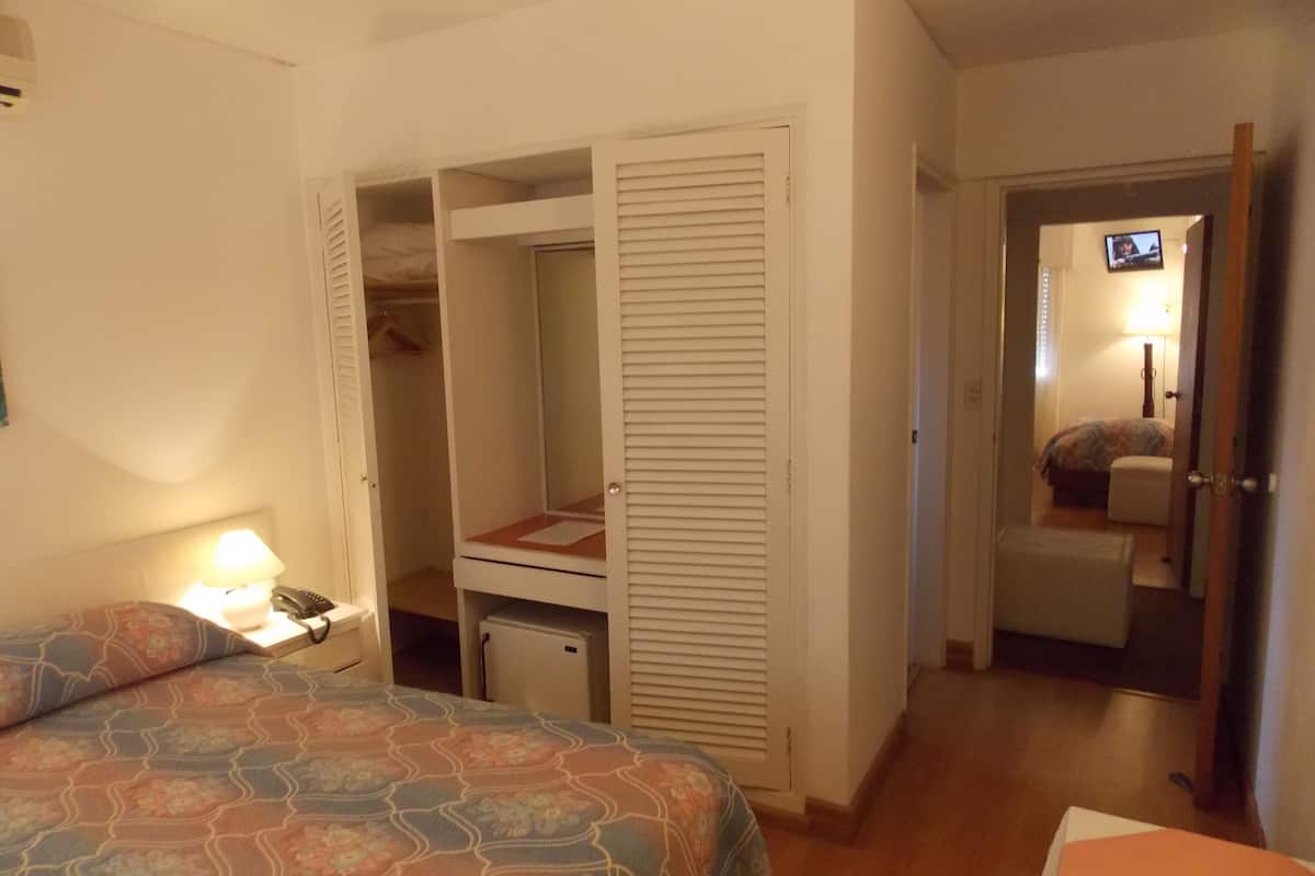 Apartamento | Minibar, caja fuerte, cortinas opacas y wifi gratis
