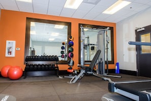 A gym with exercise equipment, dumbbells, and exercise balls. - Holiday Inn Express & Suites Austin NW - Arboretum Area by IHG (Austin)