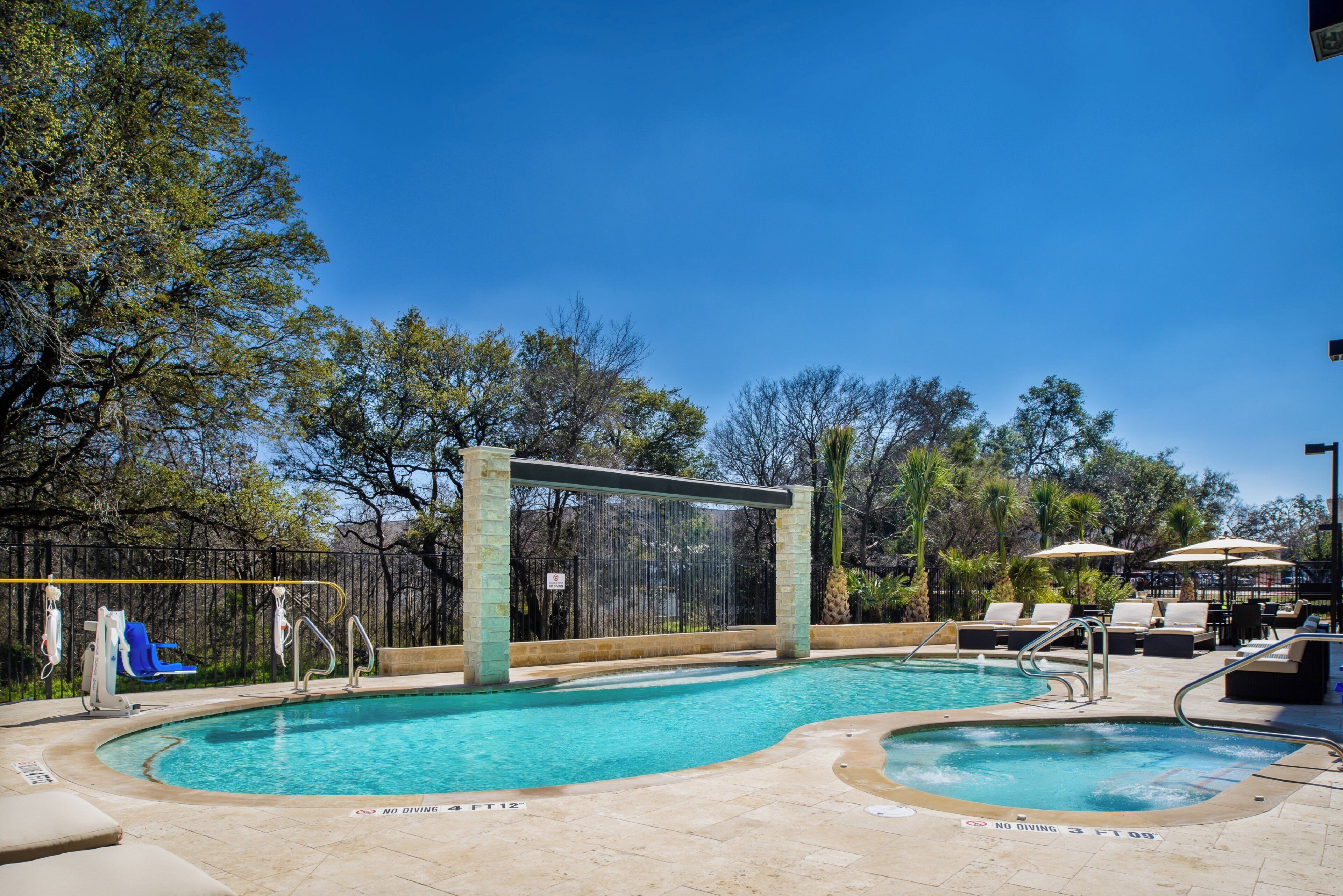 Outdoor pool, open 7:00 AM to 10:00 PM, free pool cabanas, pool loungers