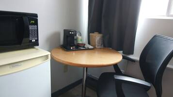 Standard Room - Outside Door | Desk, laptop workspace, iron/ironing board, cribs/infant beds
