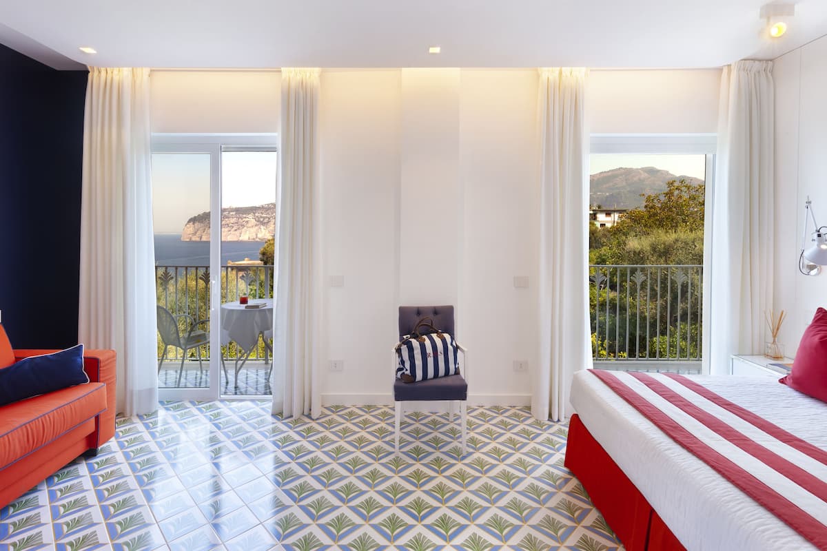 premium room, partial sea view | 1 bedroom, minibar, in-room safe, blackout curtains