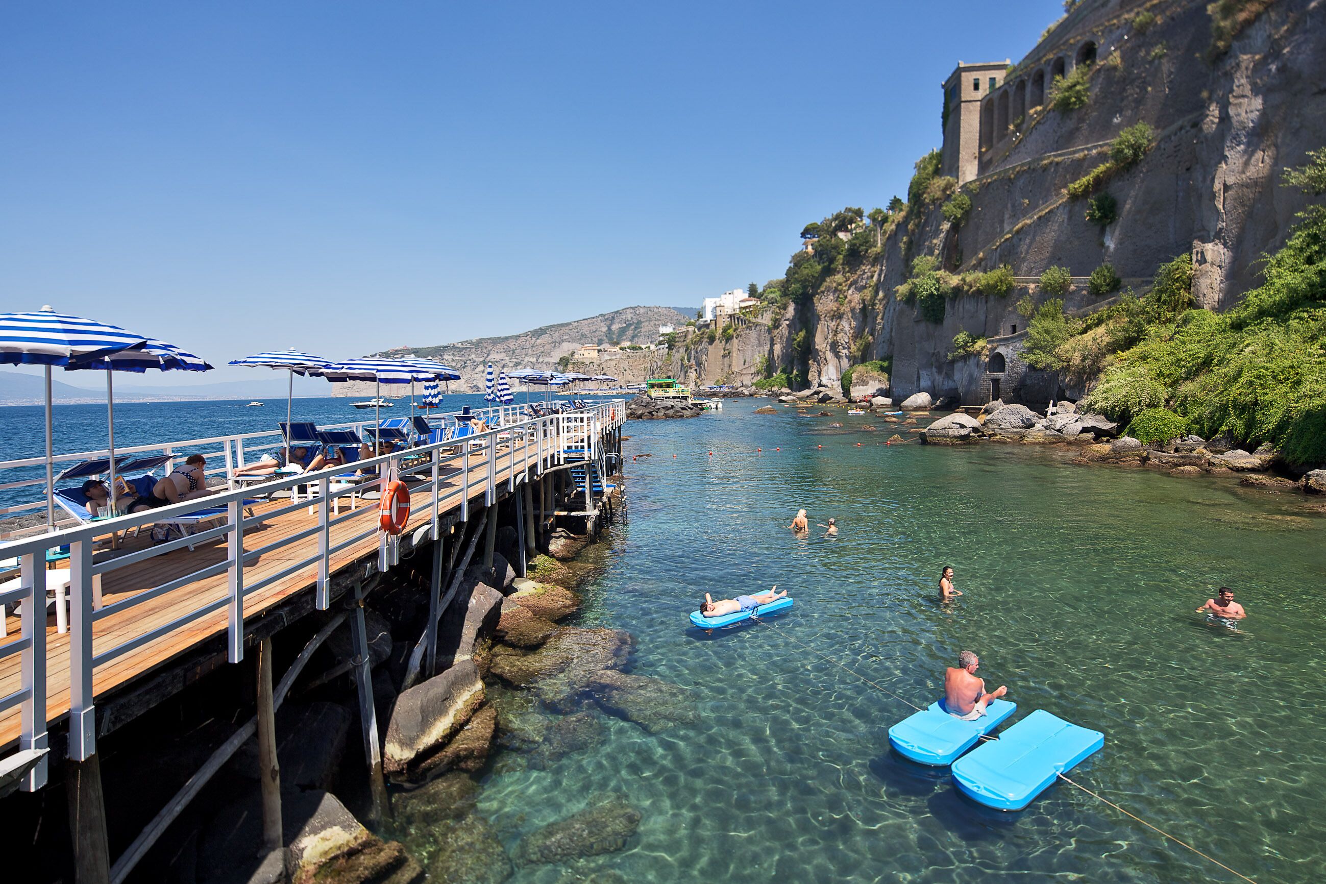 private beach, sun-loungers, beach umbrellas, beach towels
