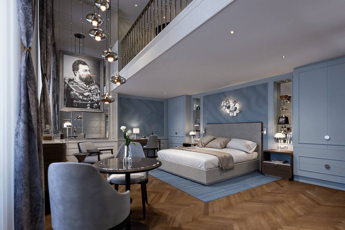 A modern bedroom with a large bed, a desk, a chair, and a dining table.
