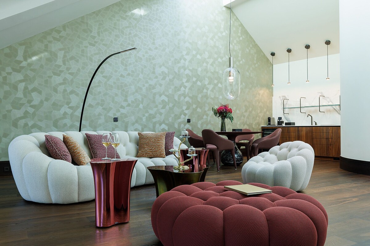 Loft Suite with Balcony | Living area | TV
