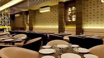 Lunch, dinner served; international cuisine, al fresco dining