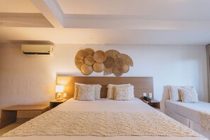 Suíte Mar Triplo | Frigobar, cofres nos quartos, cortinas blackout, Wi-Fi de cortesia