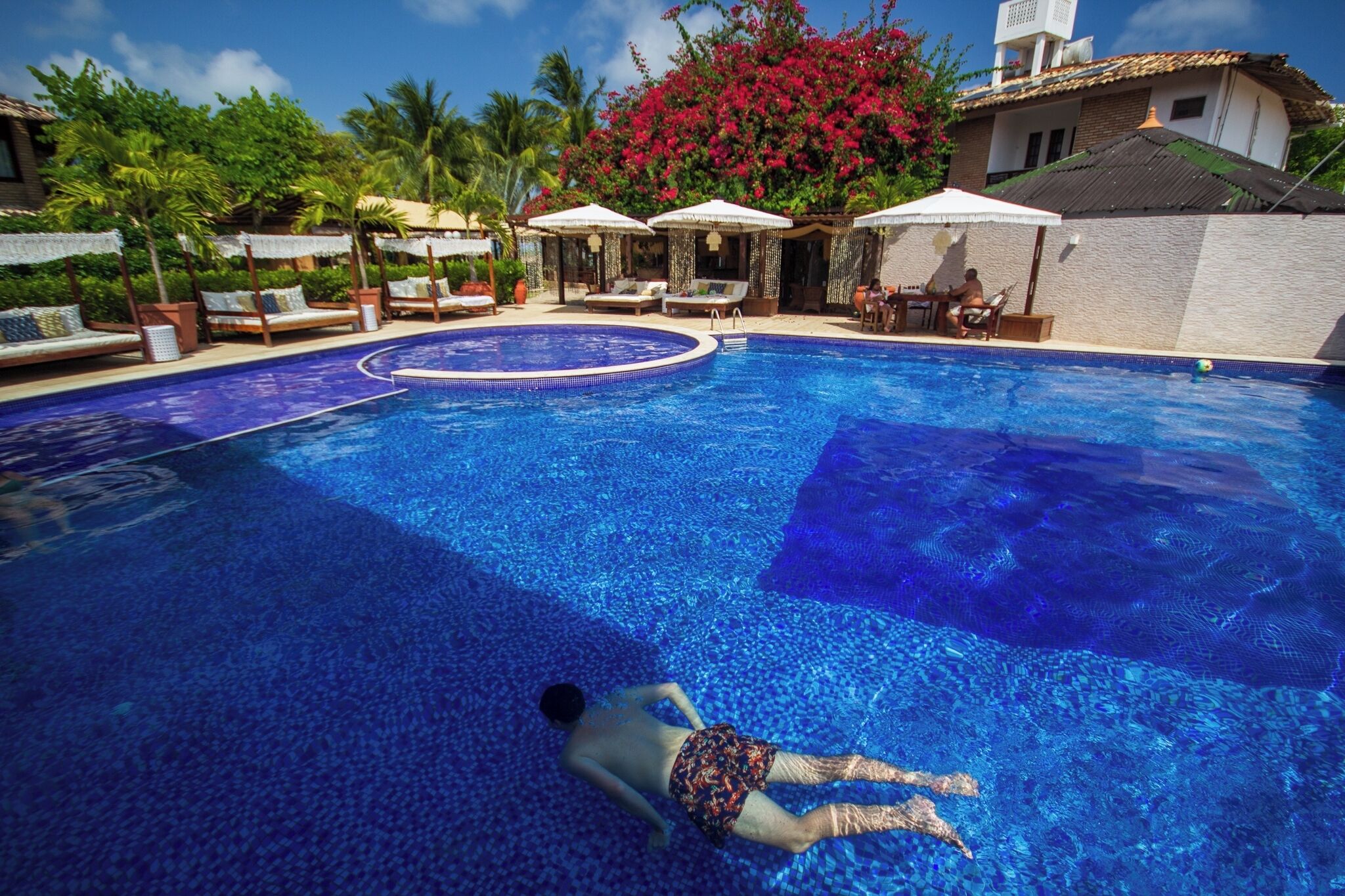 outdoor pool, pool umbrellas, pool loungers