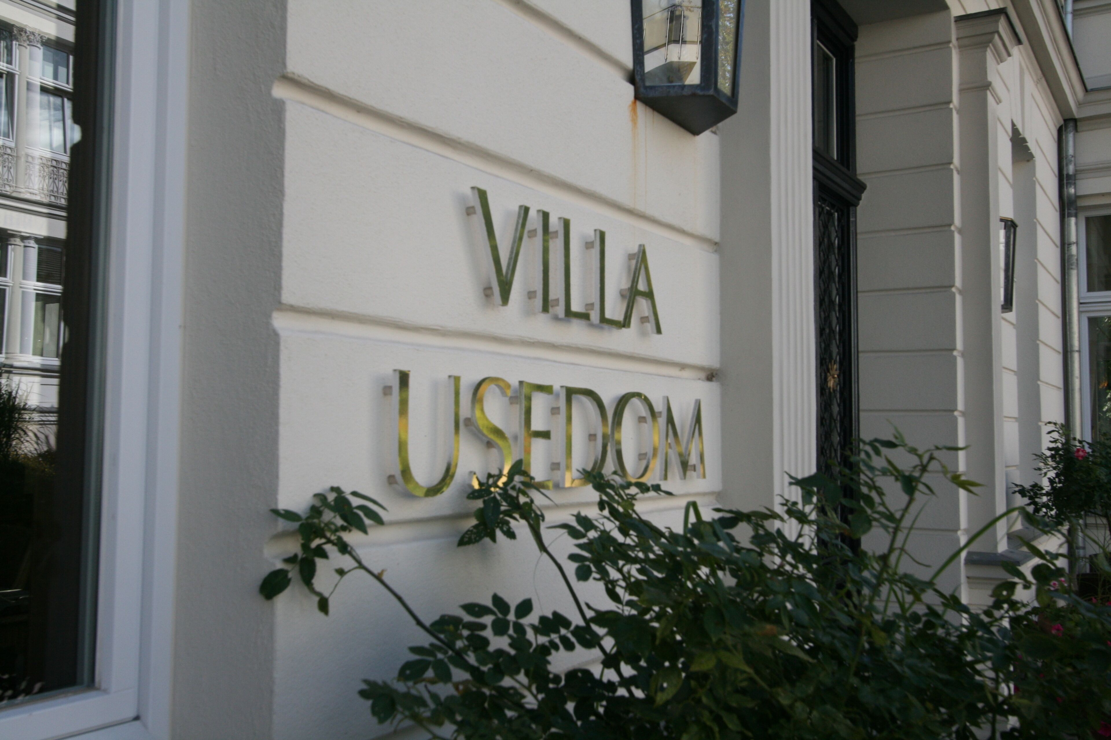 A building facade with the name "VILLA USEDOM" in large, capitalized letters.