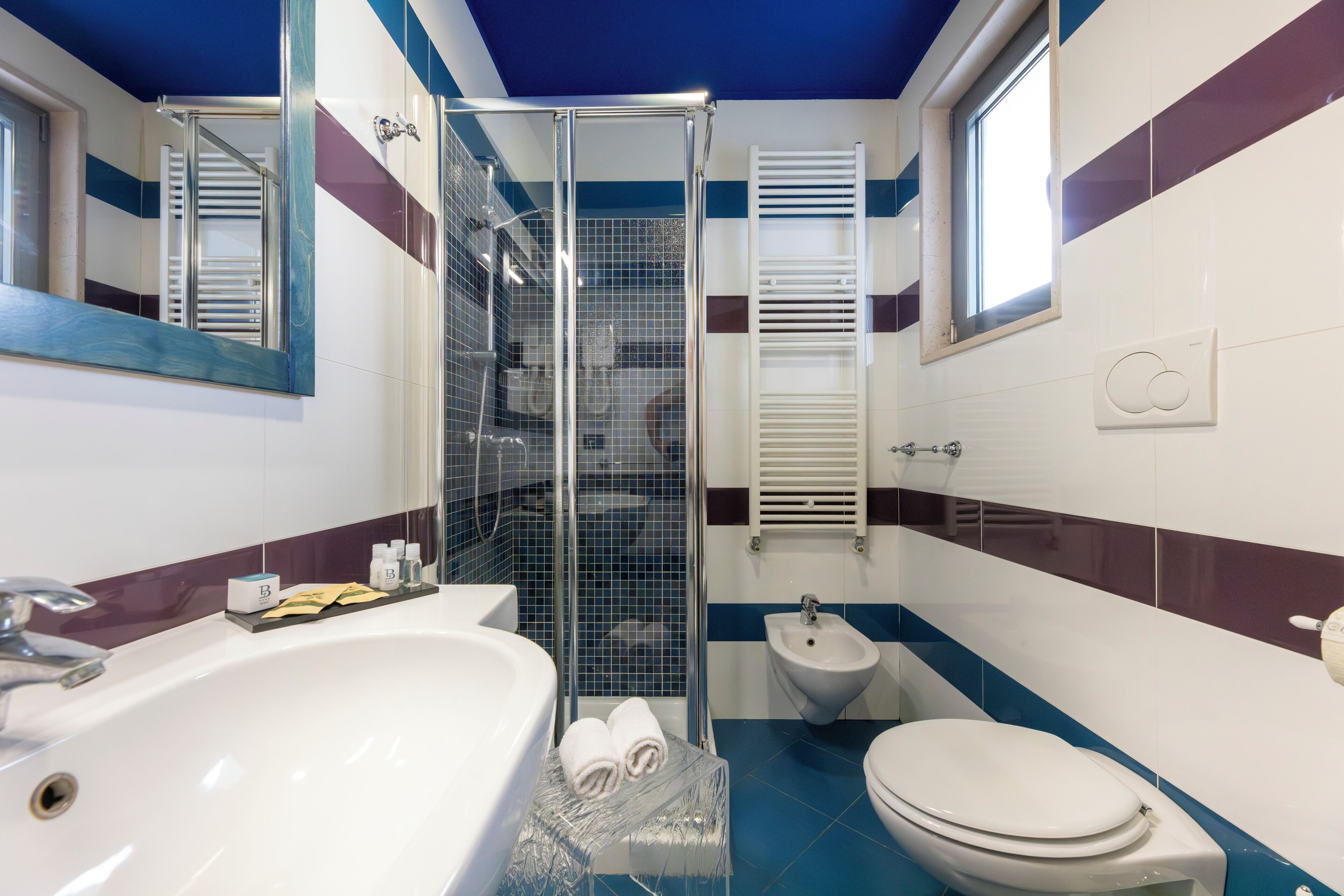 standard triple room | bathroom | shower, hair dryer, bidet, towels