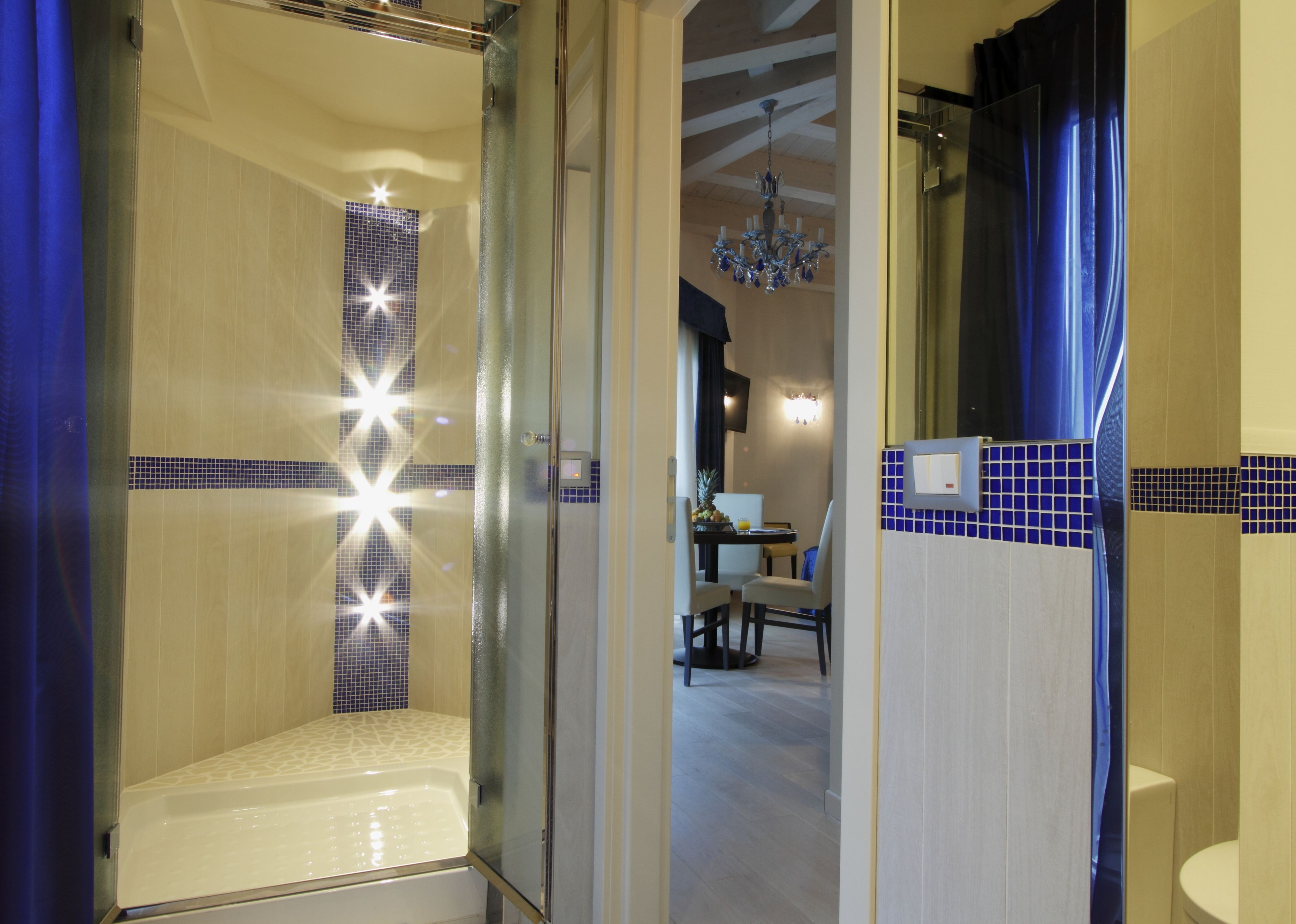 suite with balcony and spa bath | bathroom | rainfall showerhead, free toiletries, hair dryer, bidet