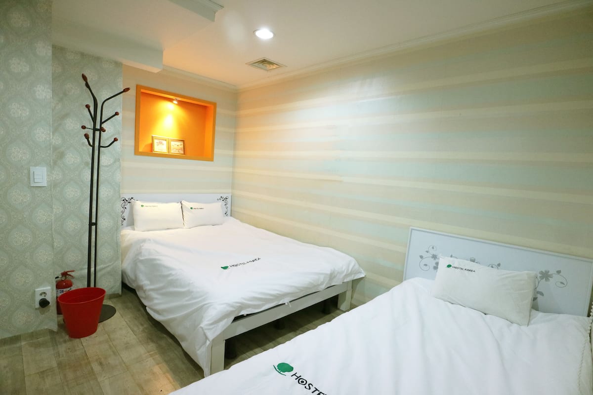 Triple Room, Shared Bathroom | Desk, laptop workspace, iron/ironing board, free WiFi