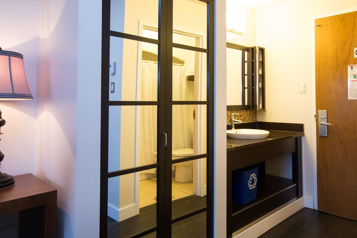 superior room, 2 queen beds | bathroom | combined shower/bathtub, free toiletries, hair dryer, bathrobes