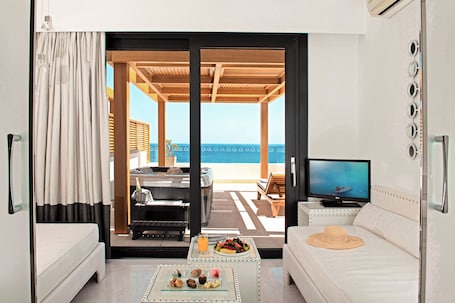 Family Suite, Sea View (Whirlpool Spa) | Minibar, in-room safe, soundproofing, iron/ironing board. Mitsis Selection Alila