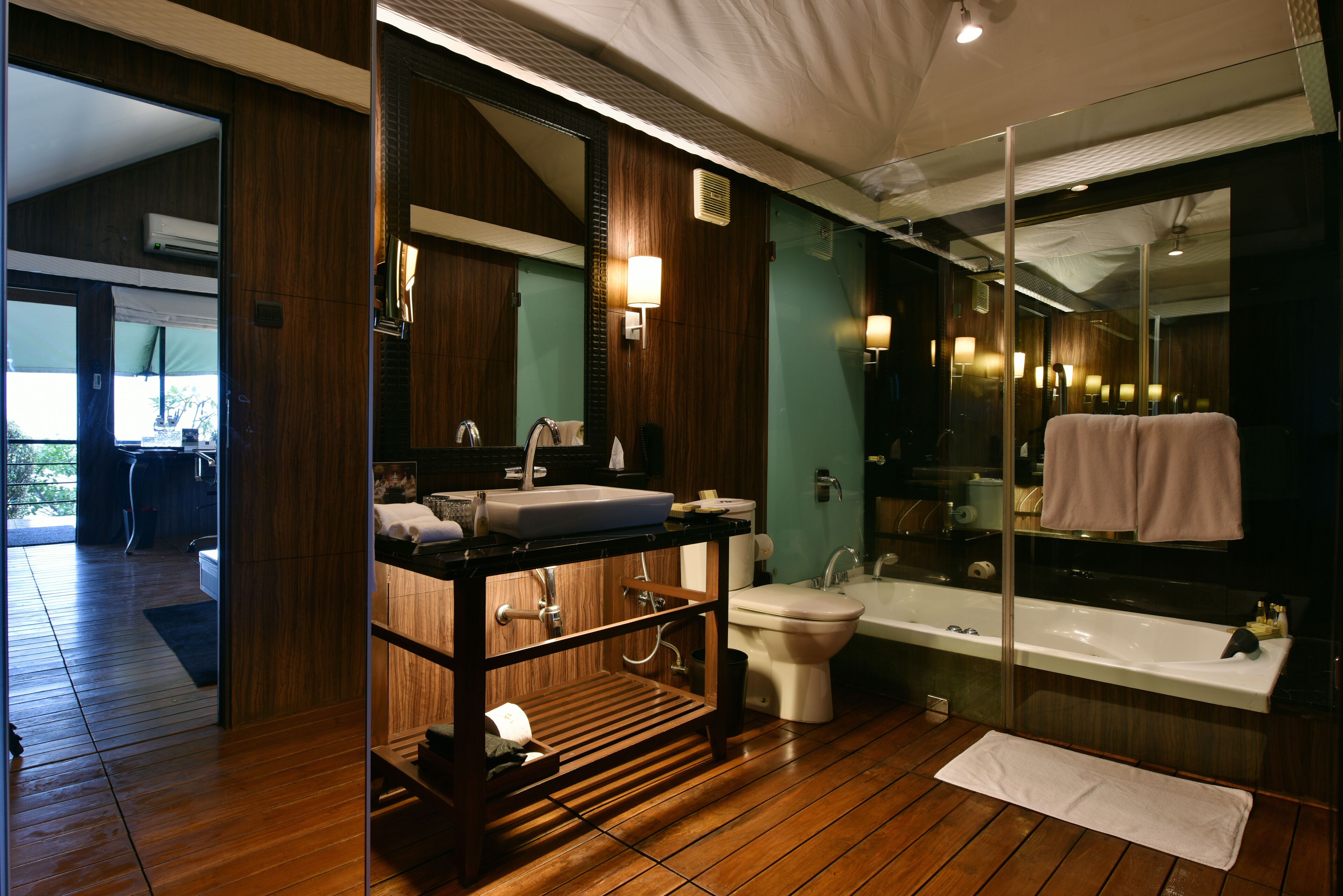 camp della resorts room king bed | bathroom | combined shower/bathtub, free toiletries, hair dryer, slippers