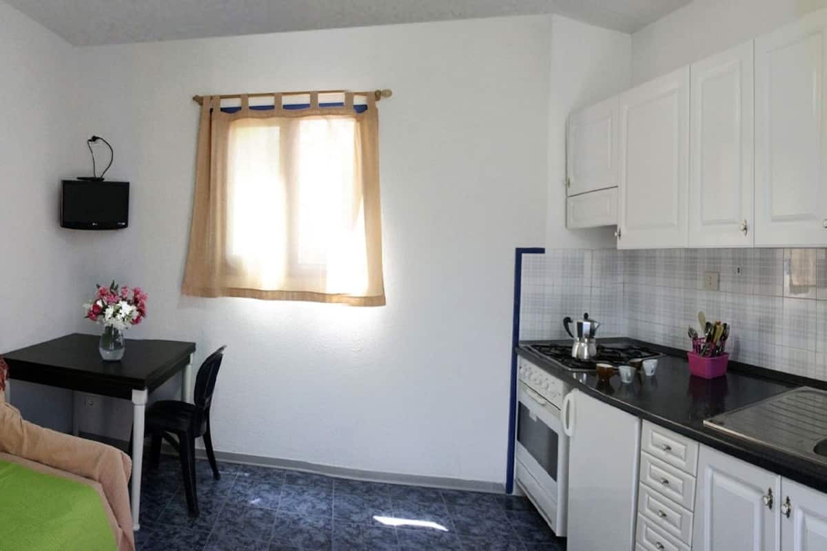 Superior bungalow, 2 slaapkamers, patio | Woonruimte