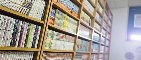 A library with bookshelves filled with books.