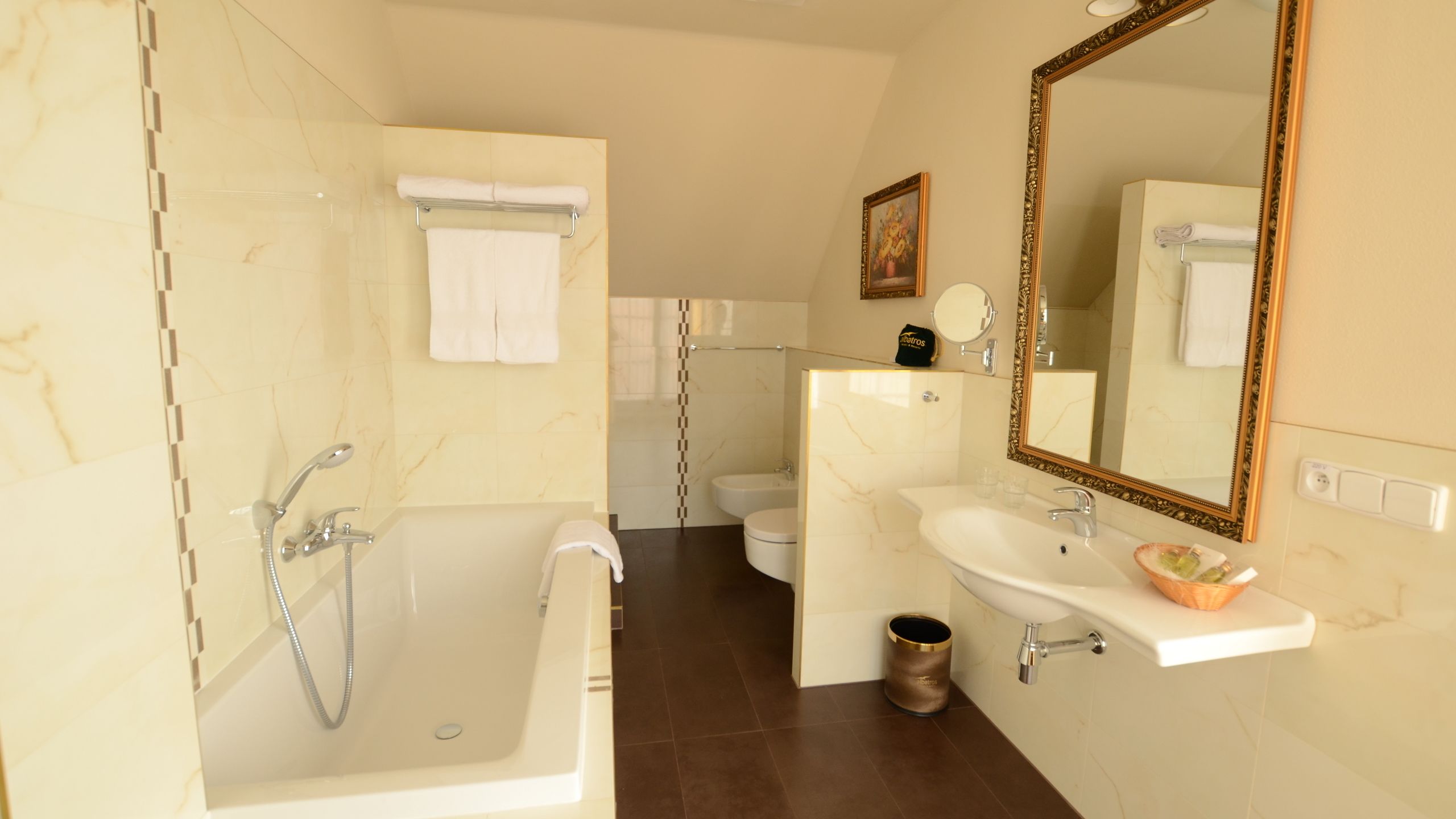 hair dryer, bathrobes, slippers, towels