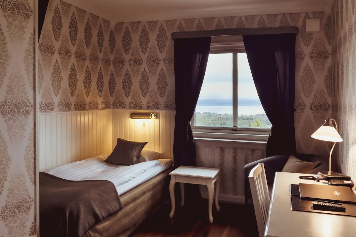 standard single room | desk, laptop workspace, blackout curtains, free wifi