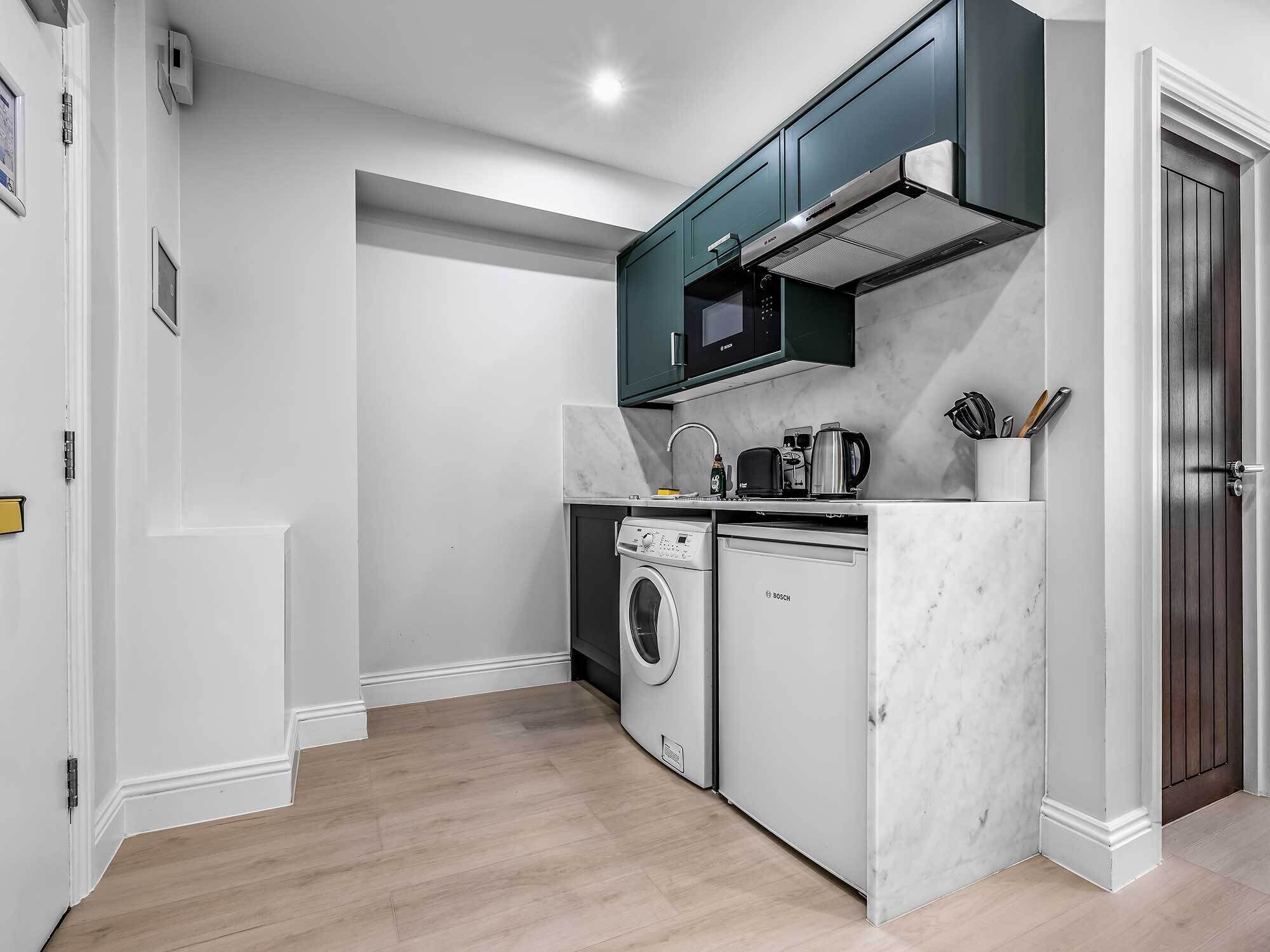 Fridge, microwave, stovetop, cookware/dishes/utensils