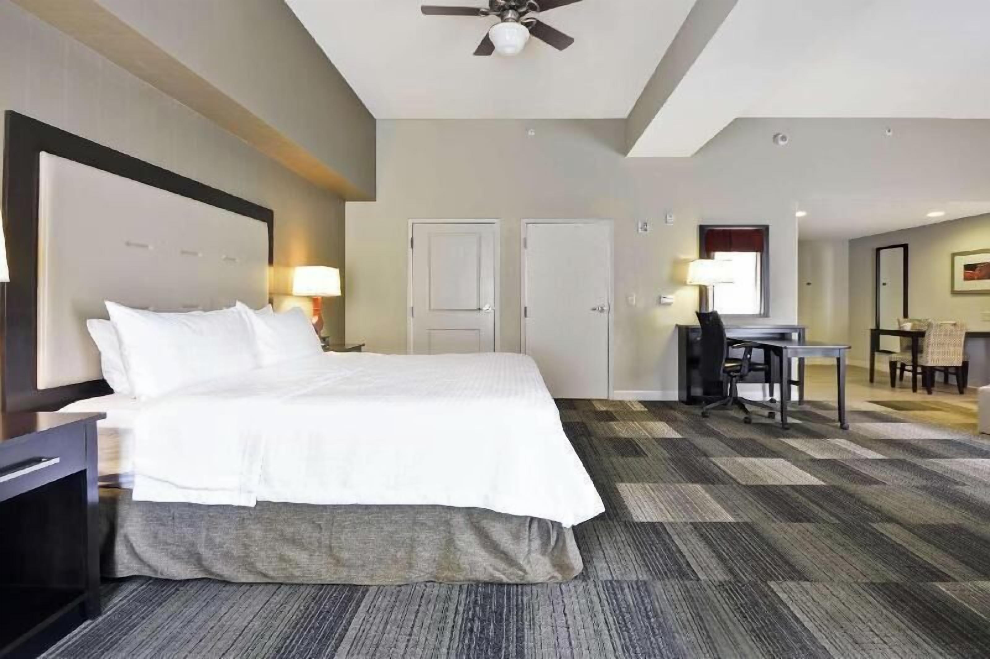 Premium bedding, pillowtop beds, desk, laptop workspace