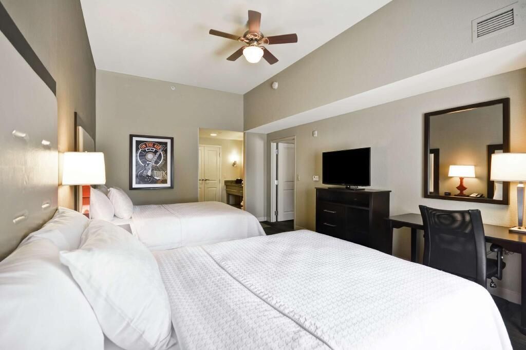 Premium bedding, pillowtop beds, desk, laptop workspace