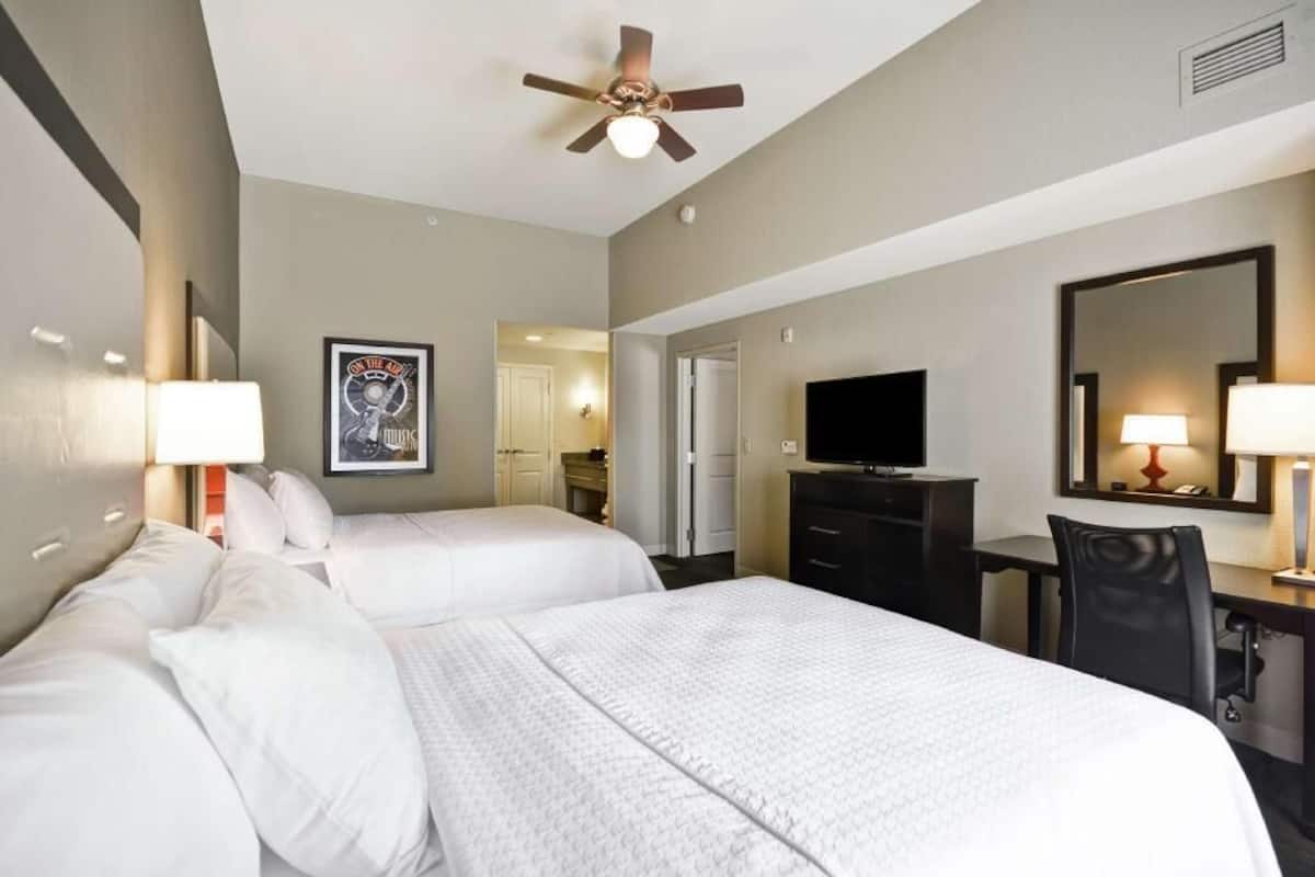 Premium bedding, pillowtop beds, desk, laptop workspace
