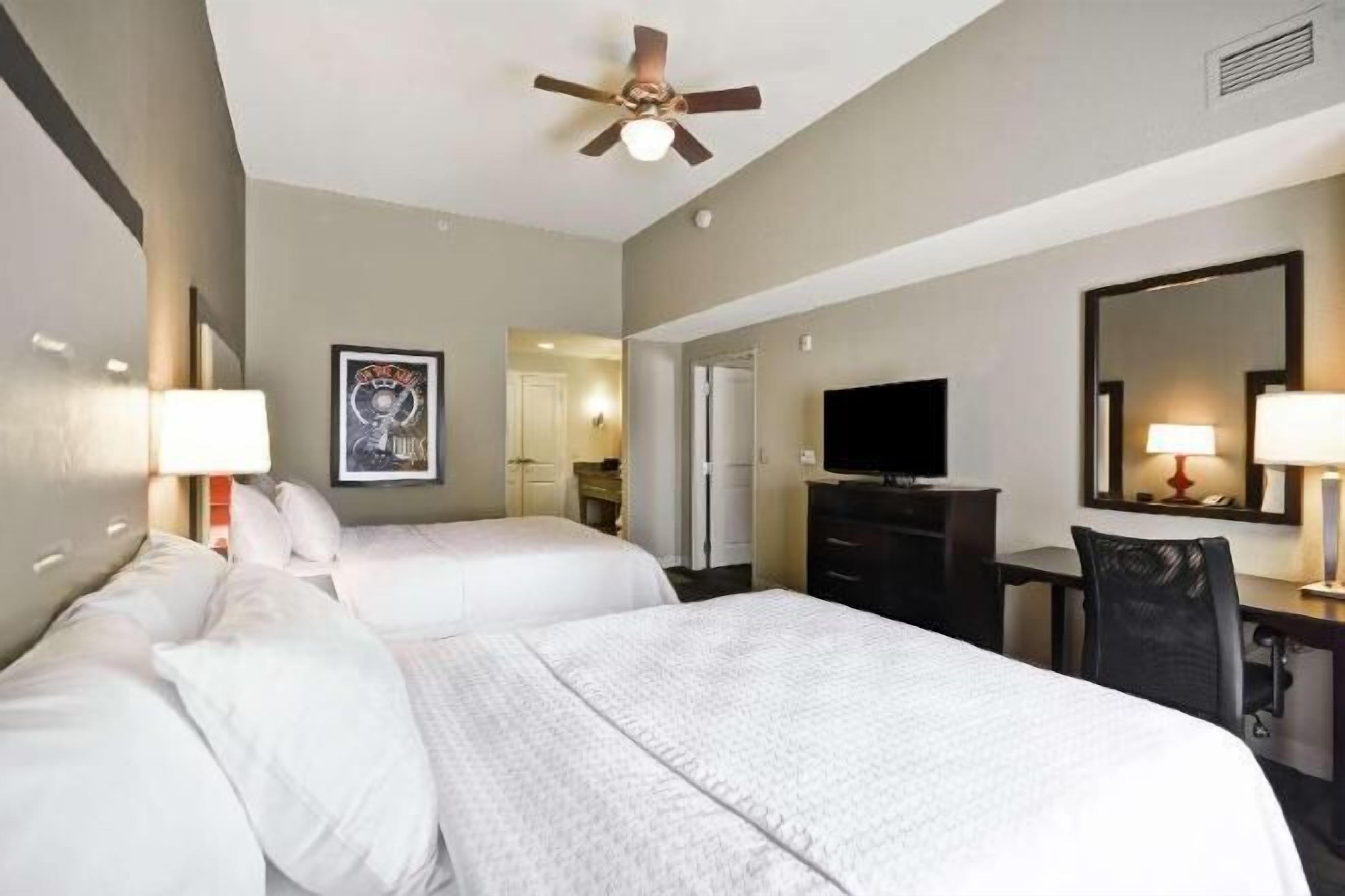 Premium bedding, pillowtop beds, desk, laptop workspace