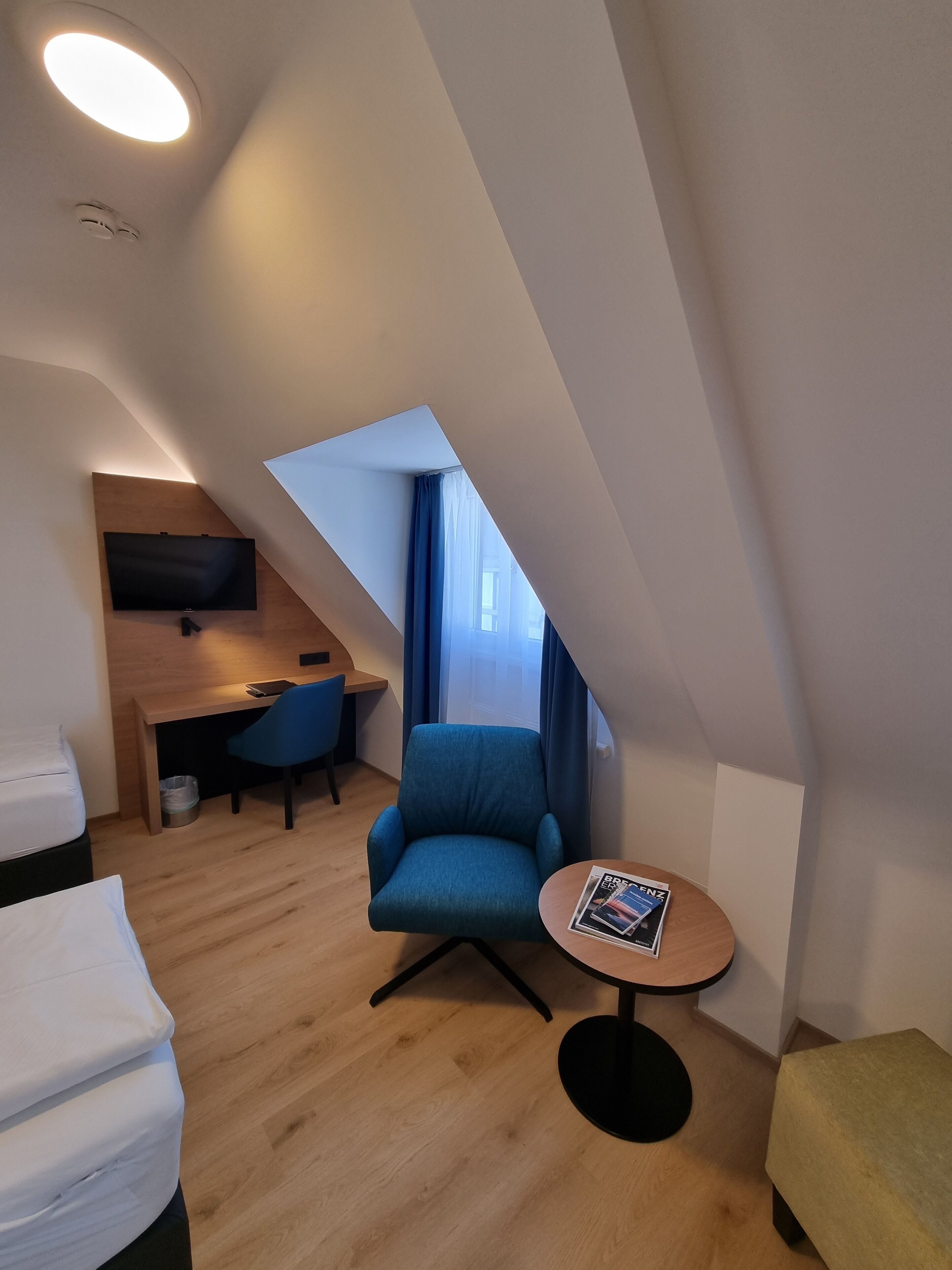 comfort twin room | living area | 15-inch led tv with satellite channels, tv