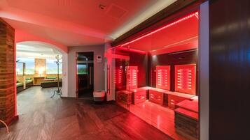 Relax in the stylish lobby, featuring a seating area with a bench and table.