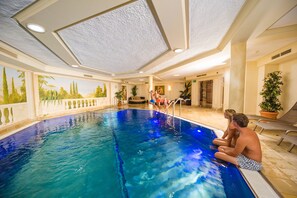 Indoor pool, sun loungers