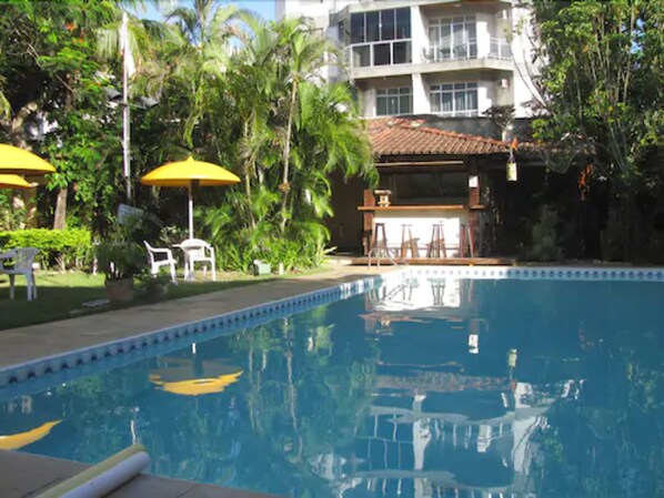 Outdoor pool, open 8 AM to 10 PM, pool umbrellas, pool loungers